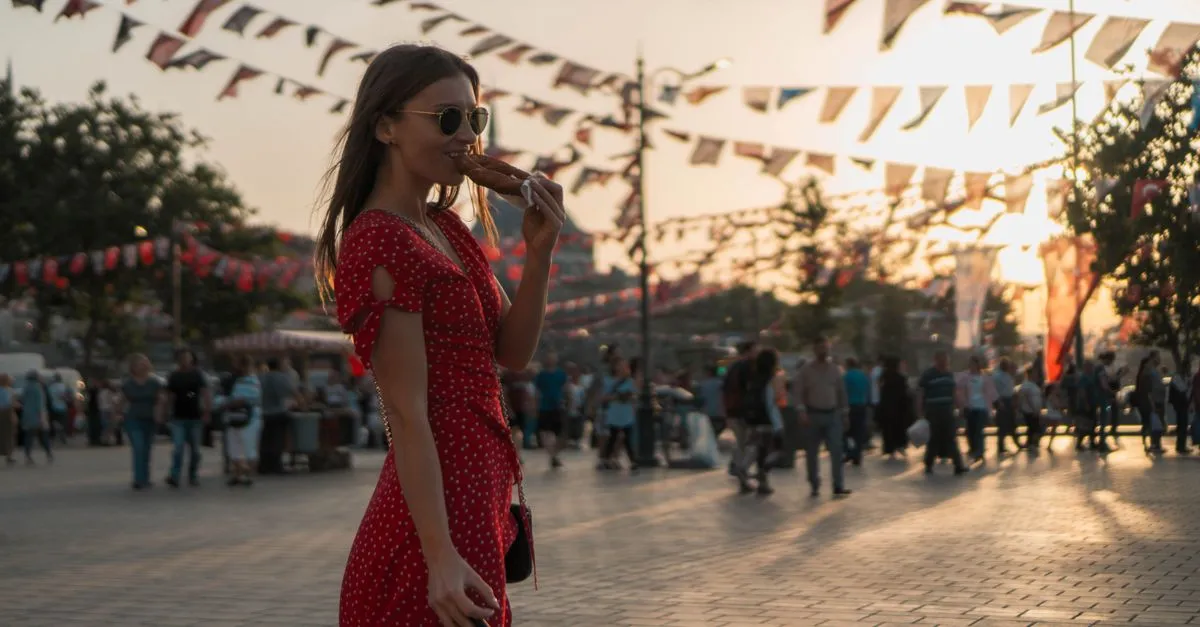 Solo traveler eating street food